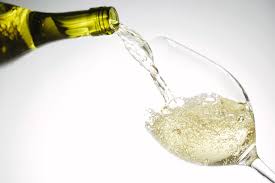 white wine being poured