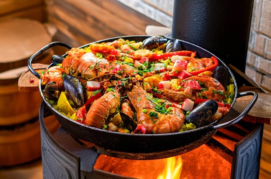 Paella cooking on open fire